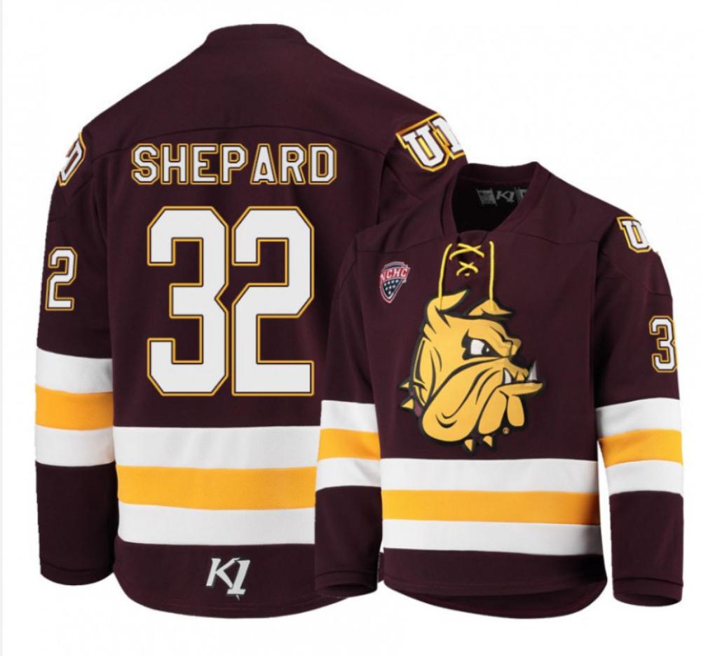 Men's Minnesota Duluth Bulldogs #32 Hunter Shepard Hockey Stitched MaroonJersey