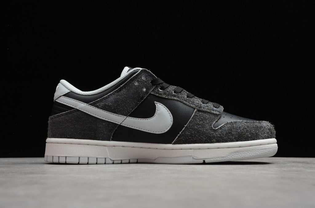 NK Dunk Low “Animal Pack Black”
