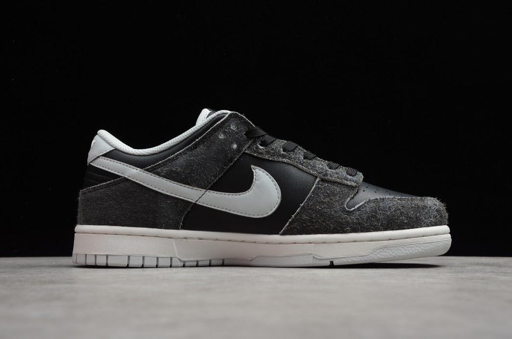 NK Dunk Low “Animal Pack Black”