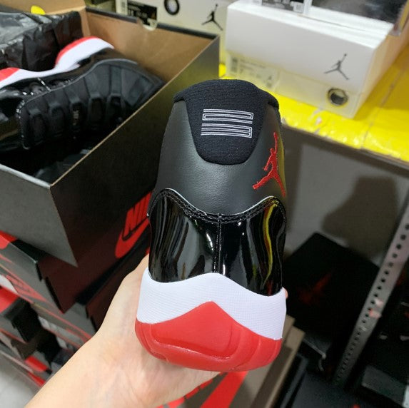 Air Jordan 11 Bred Black Red