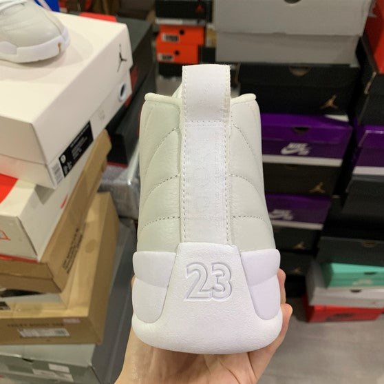 Air Jordan 12 White Platinum Owl x OVO