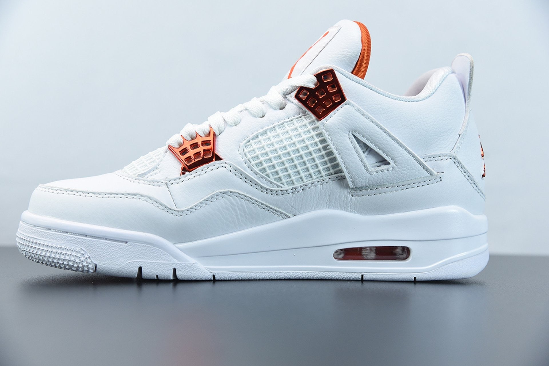 Air Jordan 4 Retro Metallic Orange
