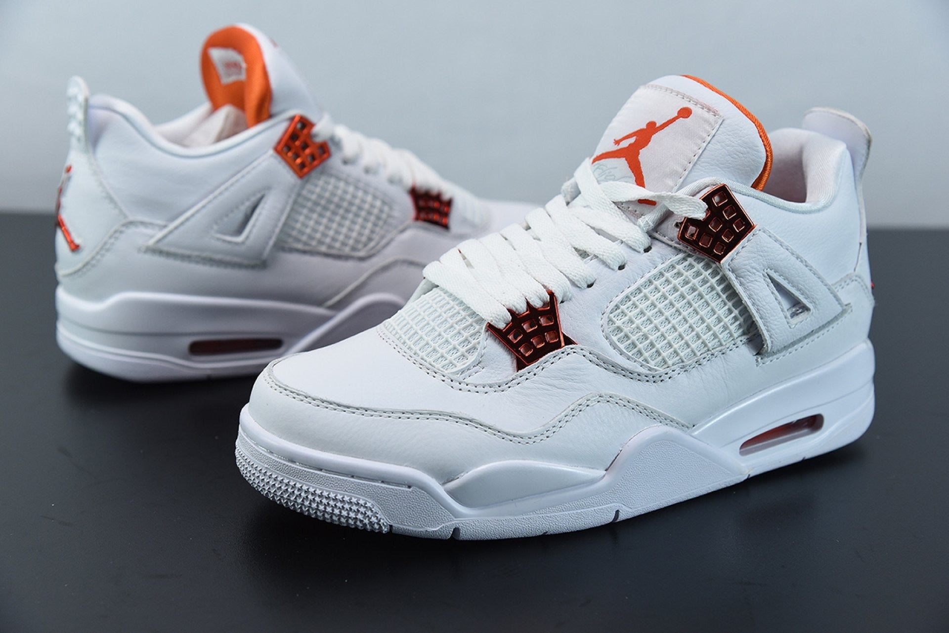 Air Jordan 4 Retro Metallic Orange