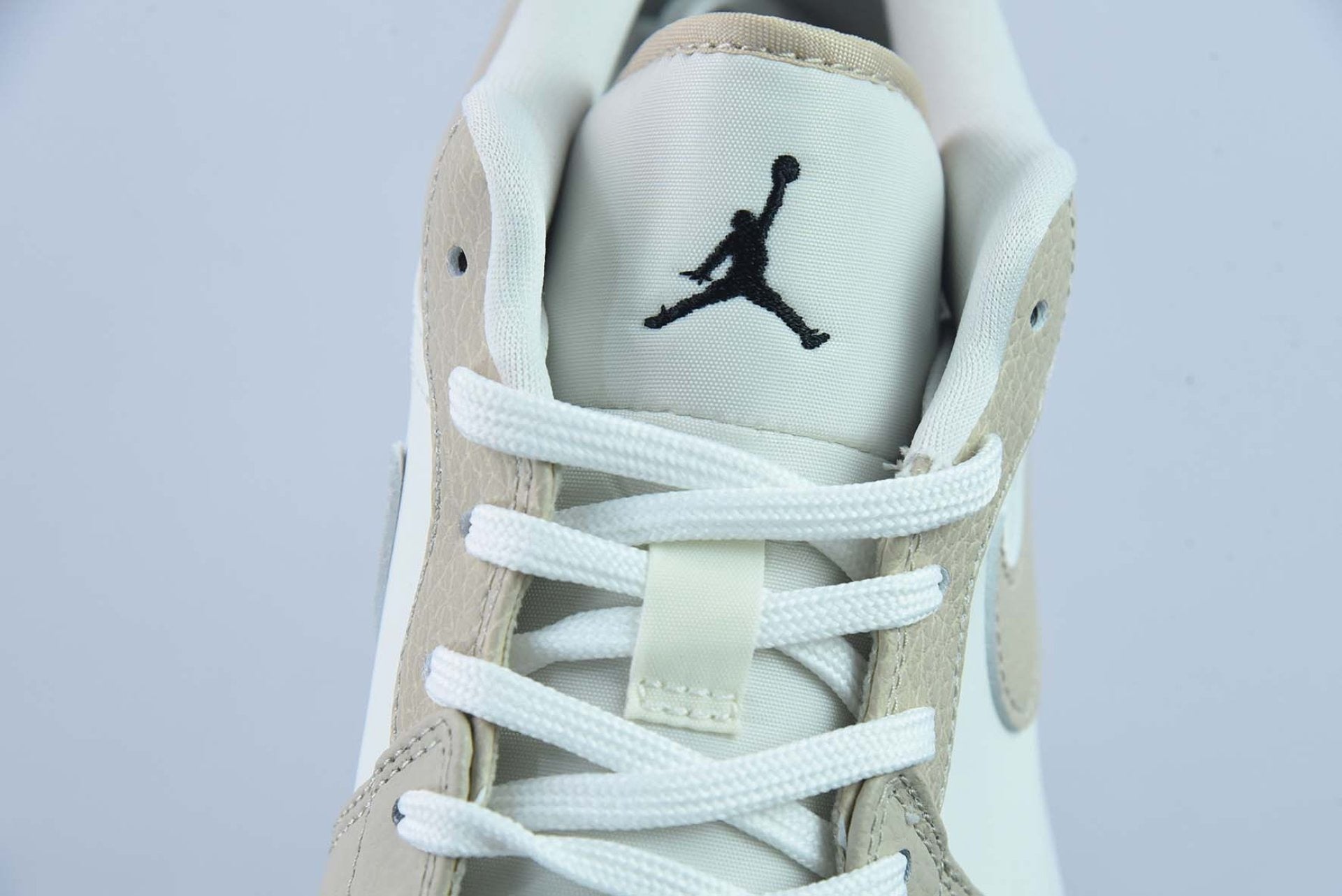 Air Jordan 1 Low Features Heavy Tumbled Tan Leather